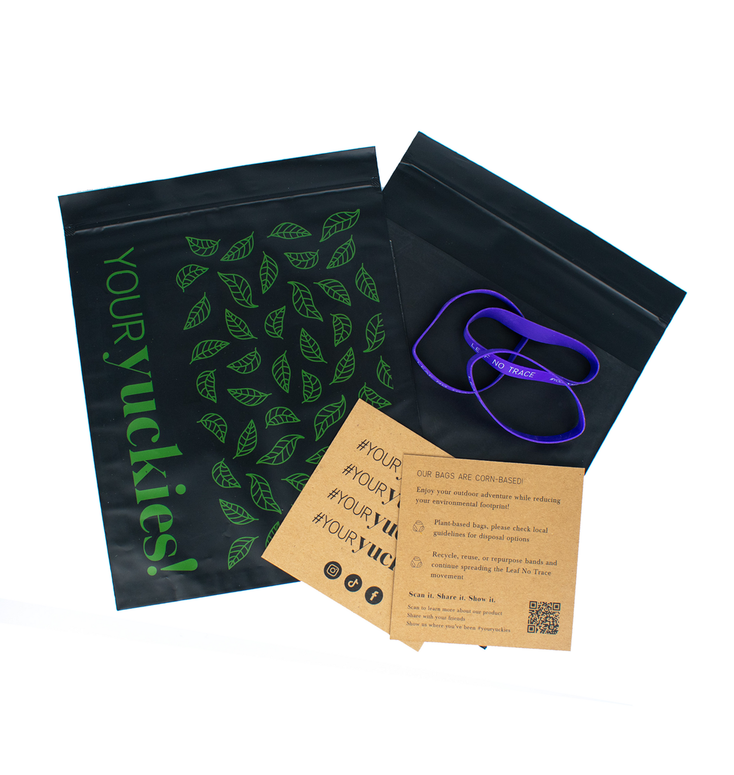 Plant-based black and green patterned bags. Back side has a black pocket. Three purple earth-friendly bands. An earth-friendly information card #YourYuckies with a description of the product on the others side.